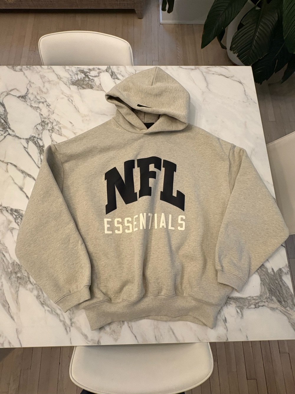 Essentials Men's Hooded Sweatshirt in Light Gray with NFL Logo